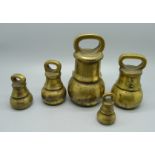 A set of five graduated brass weights, 4oz to 4lb