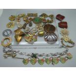 A collection of vintage 1920's/30's jewellery including Bakelite buckles, dress clips, etc.
