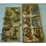 A box of early 20th Century lead soldiers, warships, horses, etc., some a/f