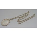 A silver chain with mounted 1889 US silver dollar, New Orleans mint, total weight 58g, chain 75cm