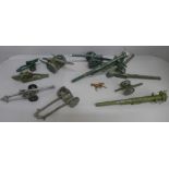 A collection of Britains model field guns, playworn