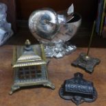 A brass inkwell, a font, a desk spike and a silver plated nautilus shaped sugar basin