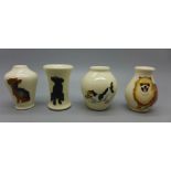 Four miniature Moorcroft vases, all with dog detail, 54mm