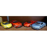 Three Maisto model vehicles and a Motormax Toy Factory Mercedes, Ferrari a/f