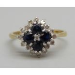 An 18ct gold, sapphire and diamond cluster ring, 4g, Q