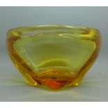 A Whitefriars glass lobed vase, golden amber, circa 1948 designed by J. Hoban