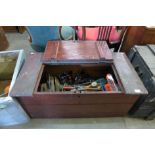 A Victorian stained pine tool chest with various tools