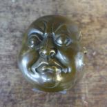 A small oriental bronze four faced Buddha