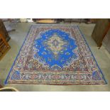 A large blue ground rug, 375 x 280cms