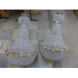 A pair of French Empire style bag shaped chandeliers