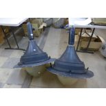 A pair of large industrial street lanterns