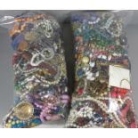 Two bags of costume jewellery