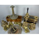 A collection of brass including candlesticks, ornaments, a bell, a copper dish, a door knocker and a