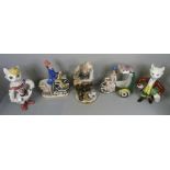 A collection of Italian figures including a pair of comical cat figures, some a/f to the cats