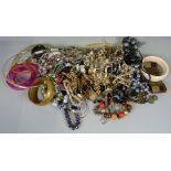 A collection of costume necklaces, bracelets, etc.