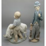 A Lladro figure of Charlie Chaplin, a/f flower from left hand, and a Nao figure of a boy with ram