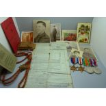 Four WWII medals including issue box to Mr J. Wright 2722900 Irish Guards, lanyard and cap badge,