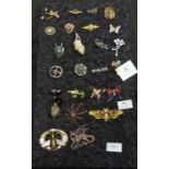 A collection of costume brooches