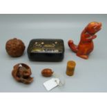 An Oriental snuff box, a frog netsuke, a carved figure, etc.