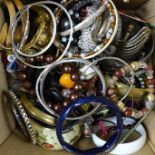 A box of costume bangles and bracelets