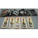 Five The Beatles Invicta Plastics guitar brooches and a Beatles Pixerama book