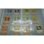 Eighty Pokemon Team Rocket sets, including holographic Dark Alacazam