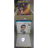 A rock n roll selection of LP records including Buddy Holly and Bill Haley picture discs and box