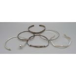 Six silver bangles, 62g