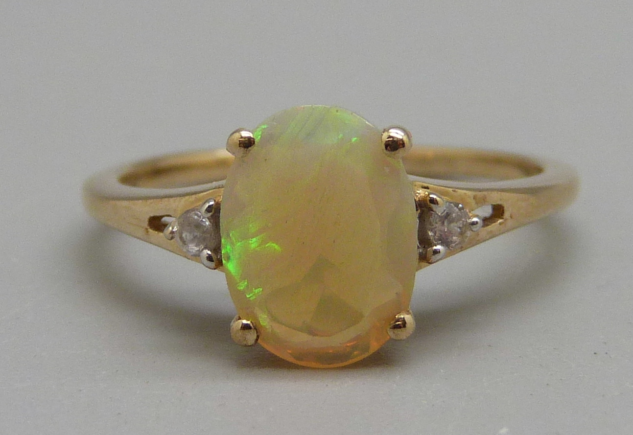 A 9ct gold, Ethiopian opal and zircon ring, 1.8g, M, with certificate