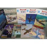 A collection of paper plane sets/kits, twenty including Spitfire and Mustang