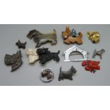 A collection of dog brooches