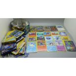 A large collection of Pokemon cards including one metal Gyarados