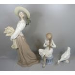 Three Nao by Lladro figures, girl sitting a/f