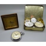 Three pocket watches including two silver, a silver fob watch and a 1930's German alarm clock
