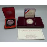 Two silver one dollar coins; United States 1995 Olympic commemorative, cased, and Canada 1975