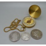 A 1901 India one Rupee coin, a South Africa 5 shillings coin, an 1890 florin and a compass with