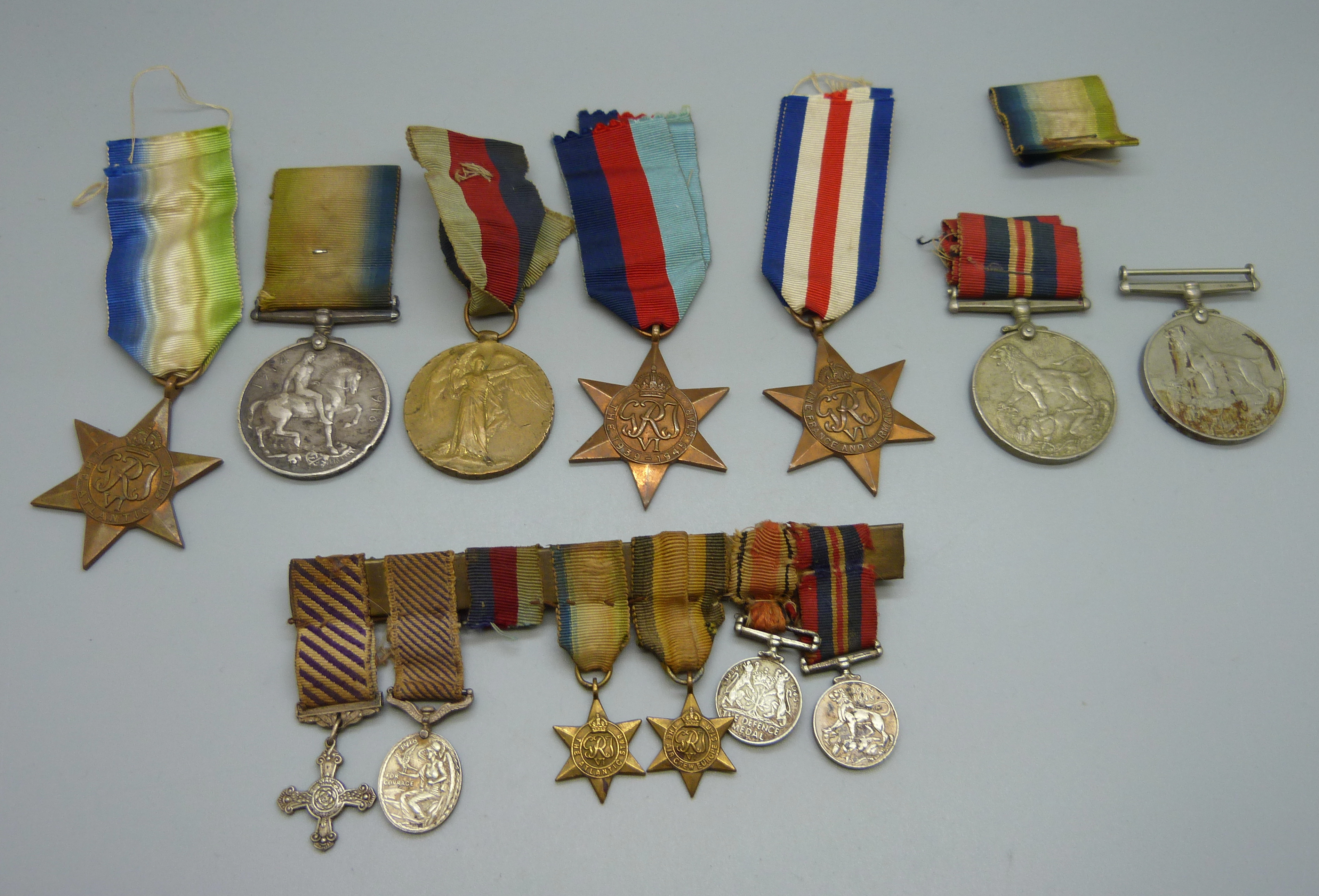 A pair of WWI medals to 7-4551 Pte. H. Lock North'd Fus., rims a/f, five WWII medals and a medal