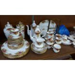 A large collection of Royal Albert Old Country Roses, including five tea cups, seven coffee cups,