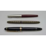 A Mont Blanc Meisterstuck fountain pen with 14k gold nib, CX1130965, a Sheaffer fountain pen and a