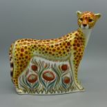 A Royal Crown Derby cheetah paperweight with gold stopper