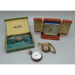 A cased travel alarm clock, a silver fob watch and two lady's cocktail wristwatches