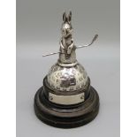 A novelty silver golfing trophy, a double faced hare stood on a golf ball, Birmingham 1930, height