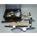 A box of wristwatches and movements including Omega