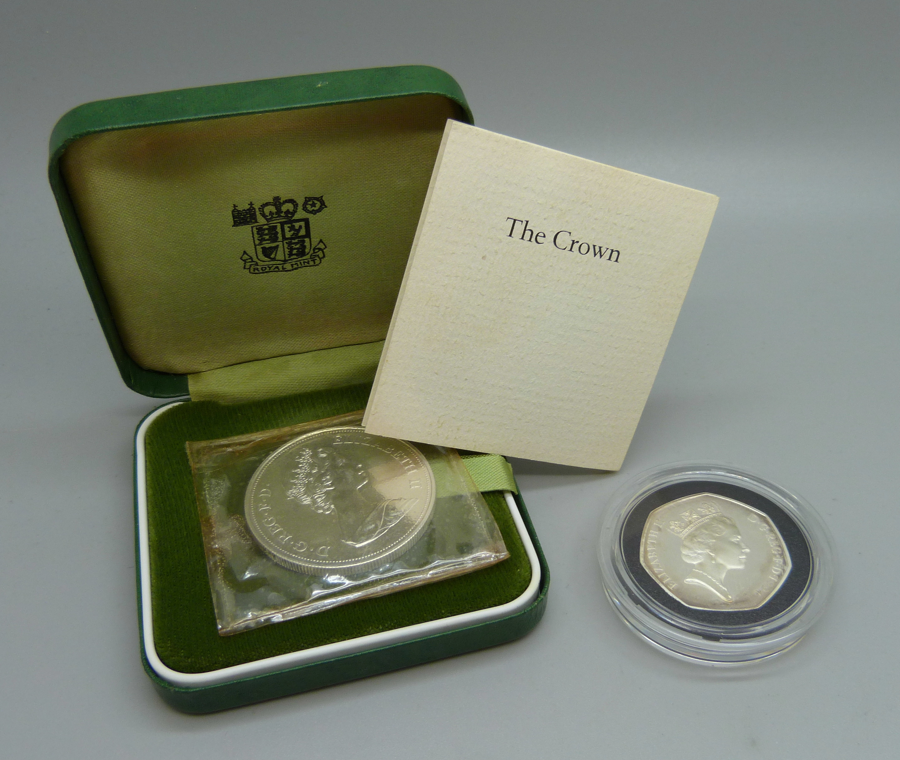A Royal Mint 1972 silver crown and 1994 silver proof D-Day 50 pence commemorative