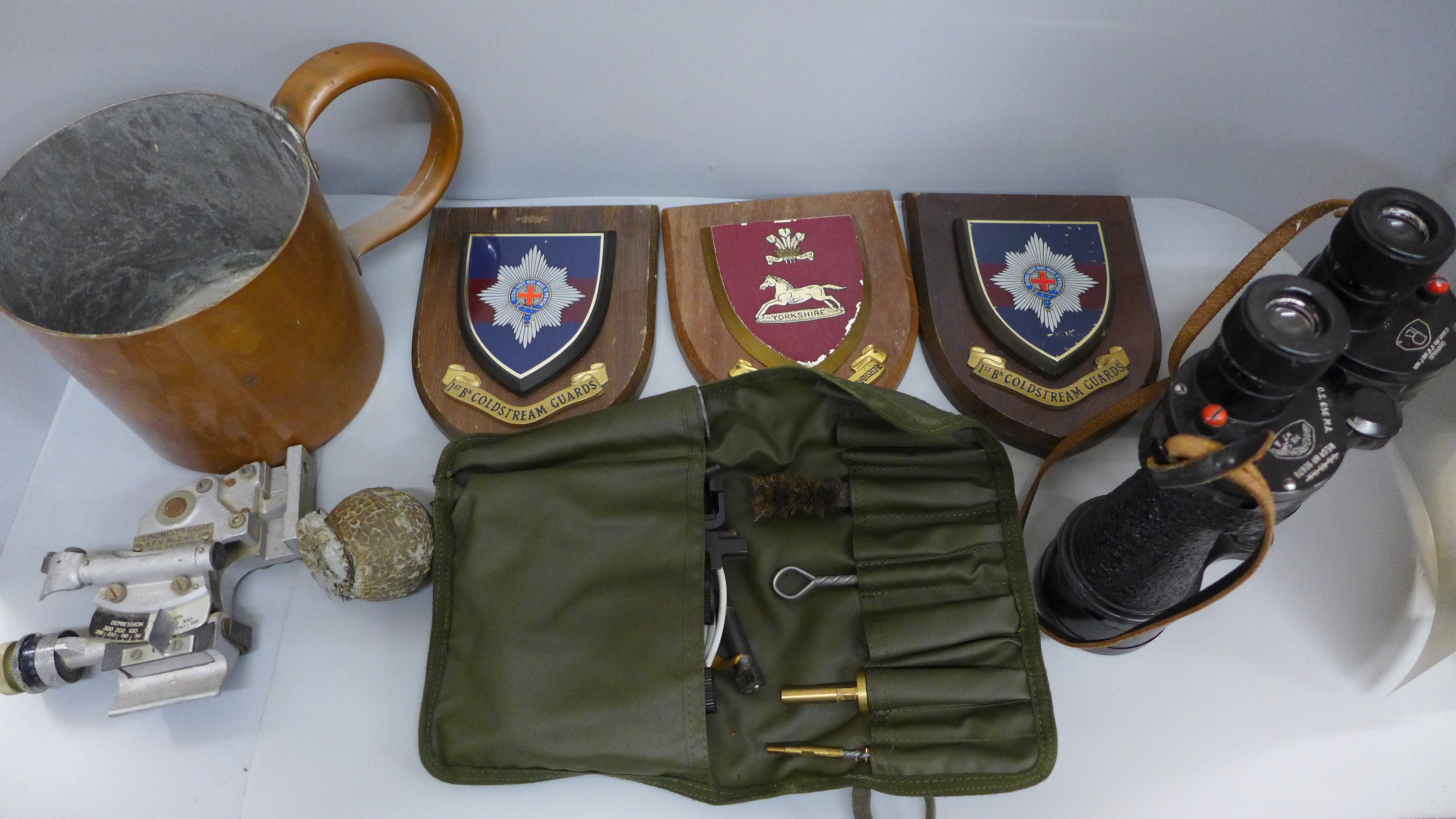 A pair of military Rosi binoculars, an SA80 cleaning kit, a Vickers mk1 tank clinometer sight and