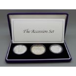 A 2002 The Accession Set, three silver proof coins, Canada, Australia and Great Britain, cased