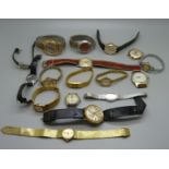 A collection of mechanical wristwatches including one Smiths Empire
