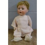 An antique German Simon Halbig Jutta 1914 bisque head boy doll, composition body, damage to hands,