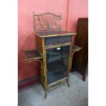 A Victorian Aesthetic Movement bamboo and black Japanned side cabinet