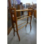 A Victorian mahogany towel rail